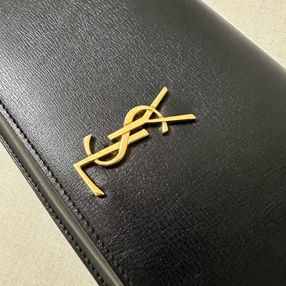 SAINT LAURENT
MONOGRAM LEATHER PHONE HOLDER W/STRAP - Picture 6 of 6